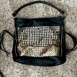 Faux leather purse w/ gold metal design & flowery interior